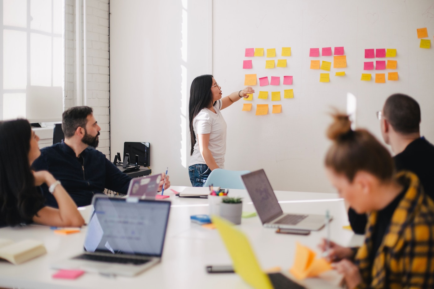 Enterprise application development — team collaborating in office
